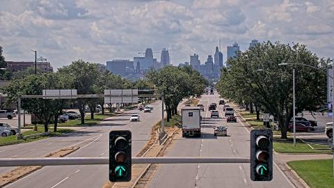 View of North Oak Trafficway traffic intersection with Kansas City skyline