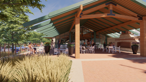 Rendering of a covered eating area with a large pitched roof and timber aesthetic, surrounded by tall grasses